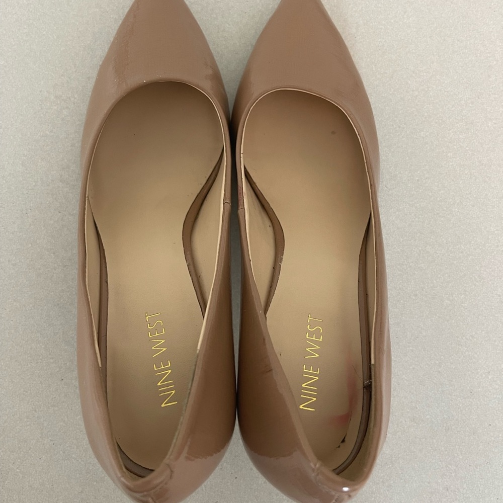 Used like new Nine West brown high heel, no blemish, no wear, no tear.
